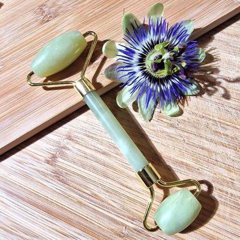 Arcmasszírozó roller